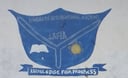 Progress International Group of Schools crest — blue shield with book and sun